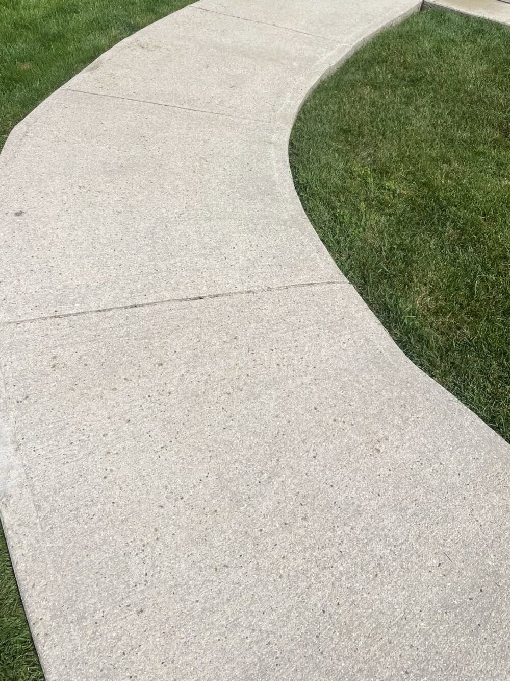 The same curved walkway cleaned to a bright even finish